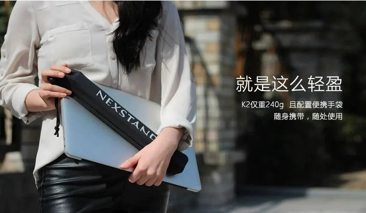 Sagacious black portable laptop stand with foldable enhanced nylon construction and storage bag