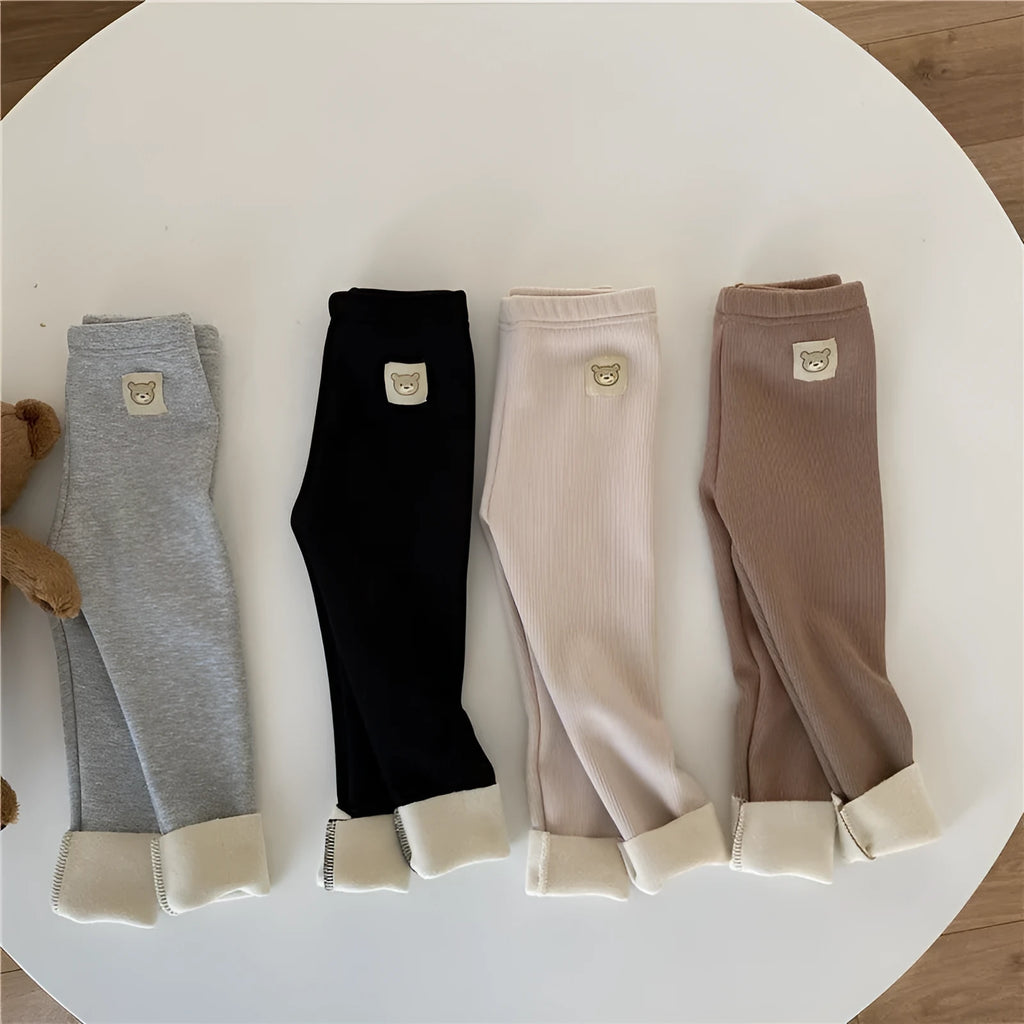 Girls' high-waisted fleece-lined leggings in beige, black, brown, and grey colours with a wool lining.