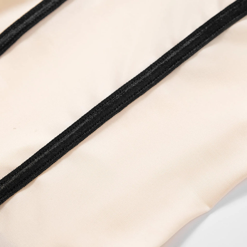 Khaki bodybuilding jumpsuit with sleeveless top, shorts, and hollow-out contrast panels.