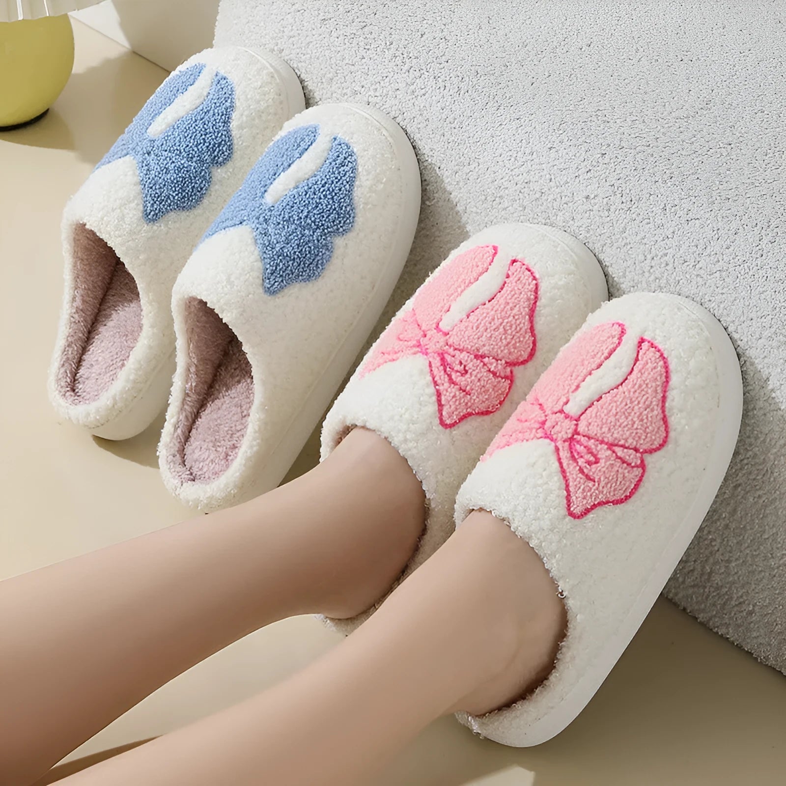 Cartoon bow knot cotton slippers in blue with suede upper and TPR sole.