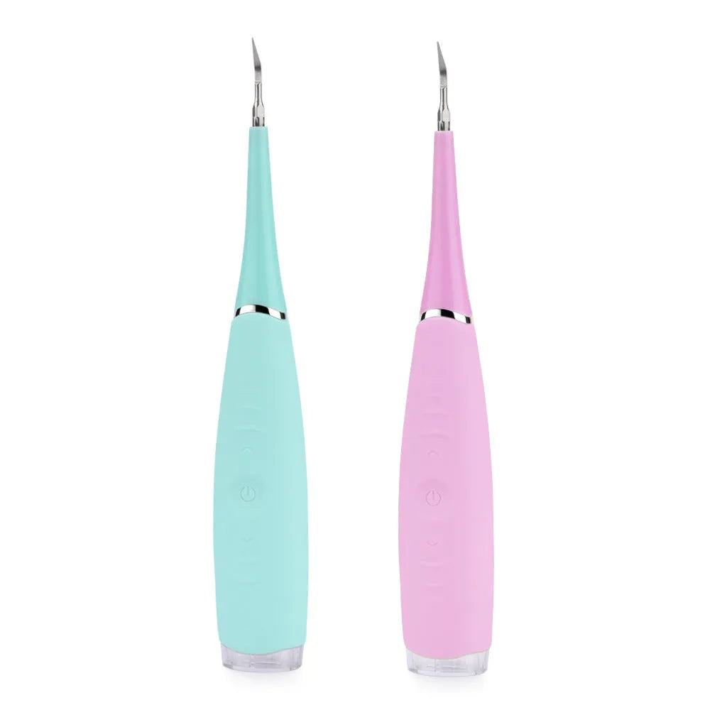 Electric dental scaler with USB rechargeable base, pink colour, compact design for home calculus removal