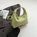 Soft PU leather bucket-style messenger bag in beige with a front sandwich pocket and shoulder strap.