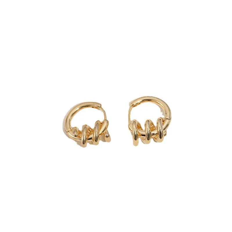 Spiral wound ear clip earrings in frosted geometric shape, copper with gold or silver plating, 1.75cm by 2.16cm.