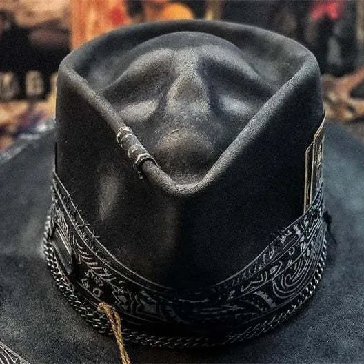 Handmade wool felt skull hat with a conical crown and blue denim trim.