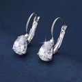 Women's drop-shaped metal earrings with platinum gemstone decoration in gold and platinum colour options