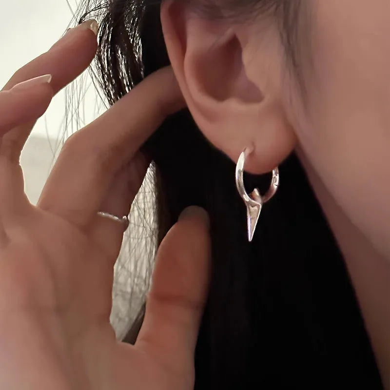 Geometric star-shaped ear clips for women with platinum electroplated finish on copper base