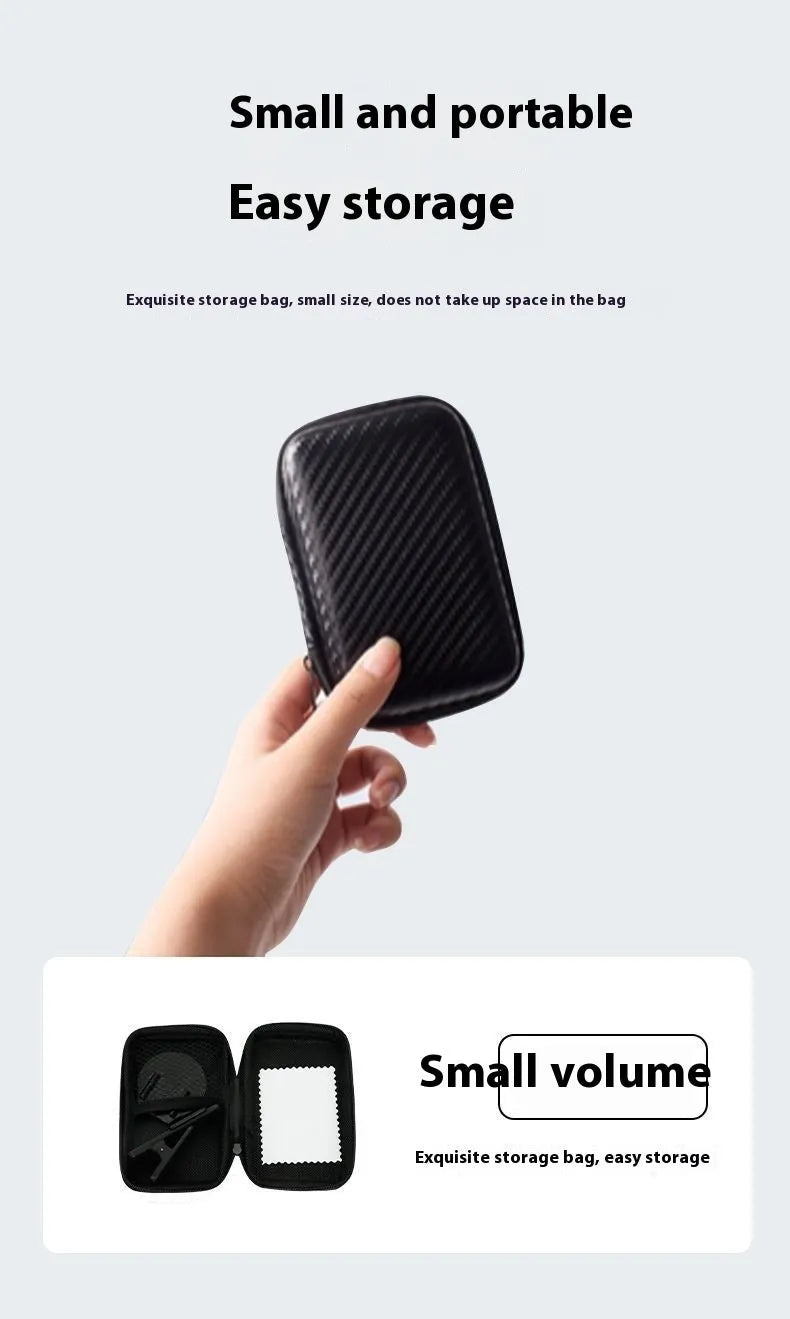 Black mobile phone rear camera self-timer mirror clip with plastic and glass construction, shown attached to a phone.
