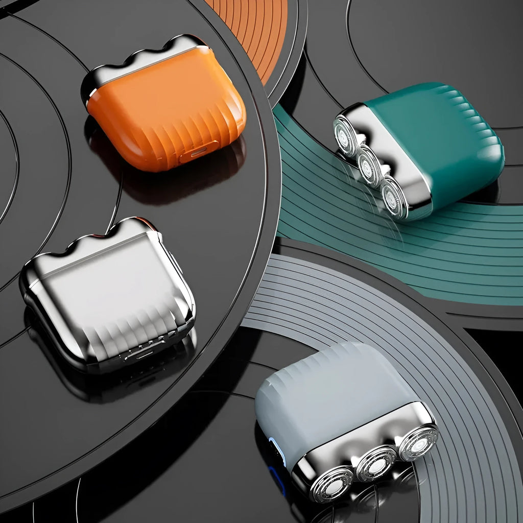 Mini electric shaver with three floating cutter heads in gun colour option