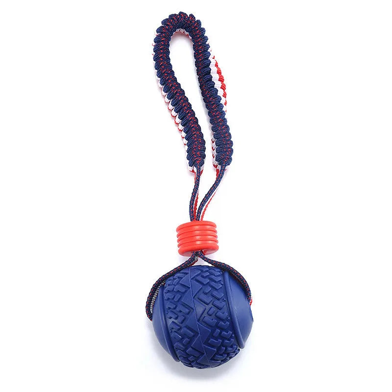 Blue dog ball with rope toy showing textured rubber surface and rope attachment