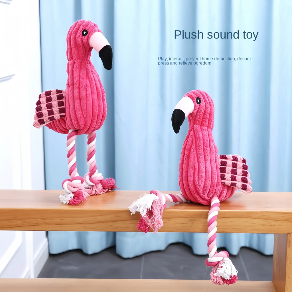 Pink corduroy animal-shaped dog toy with internal squeaker for bite-resistant play.