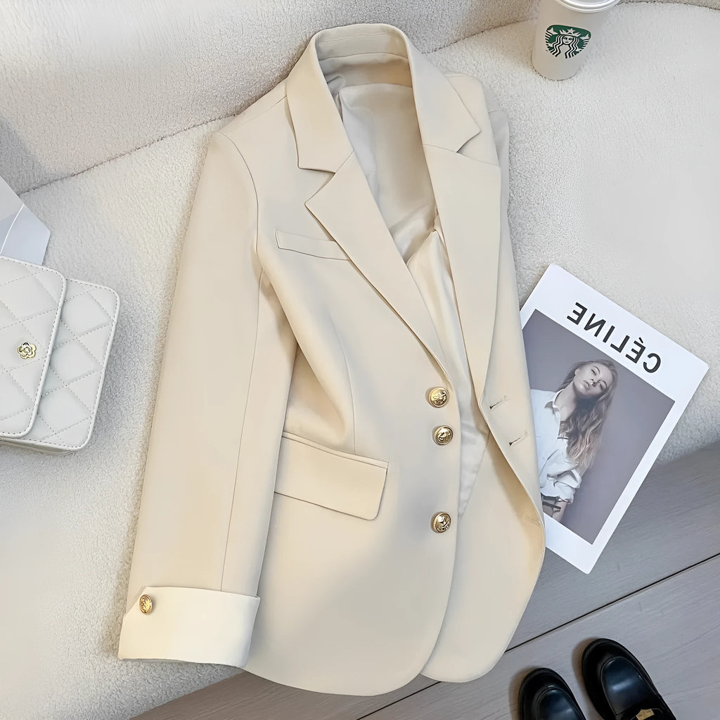 Korean style loose fit women's coat in milky white, showing front view with pockets.