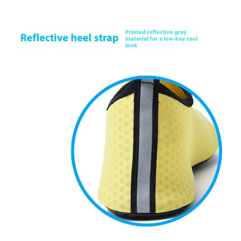 Non-slip water shoes with elastic band and mesh upper in Snowflake Mesh blue pattern.