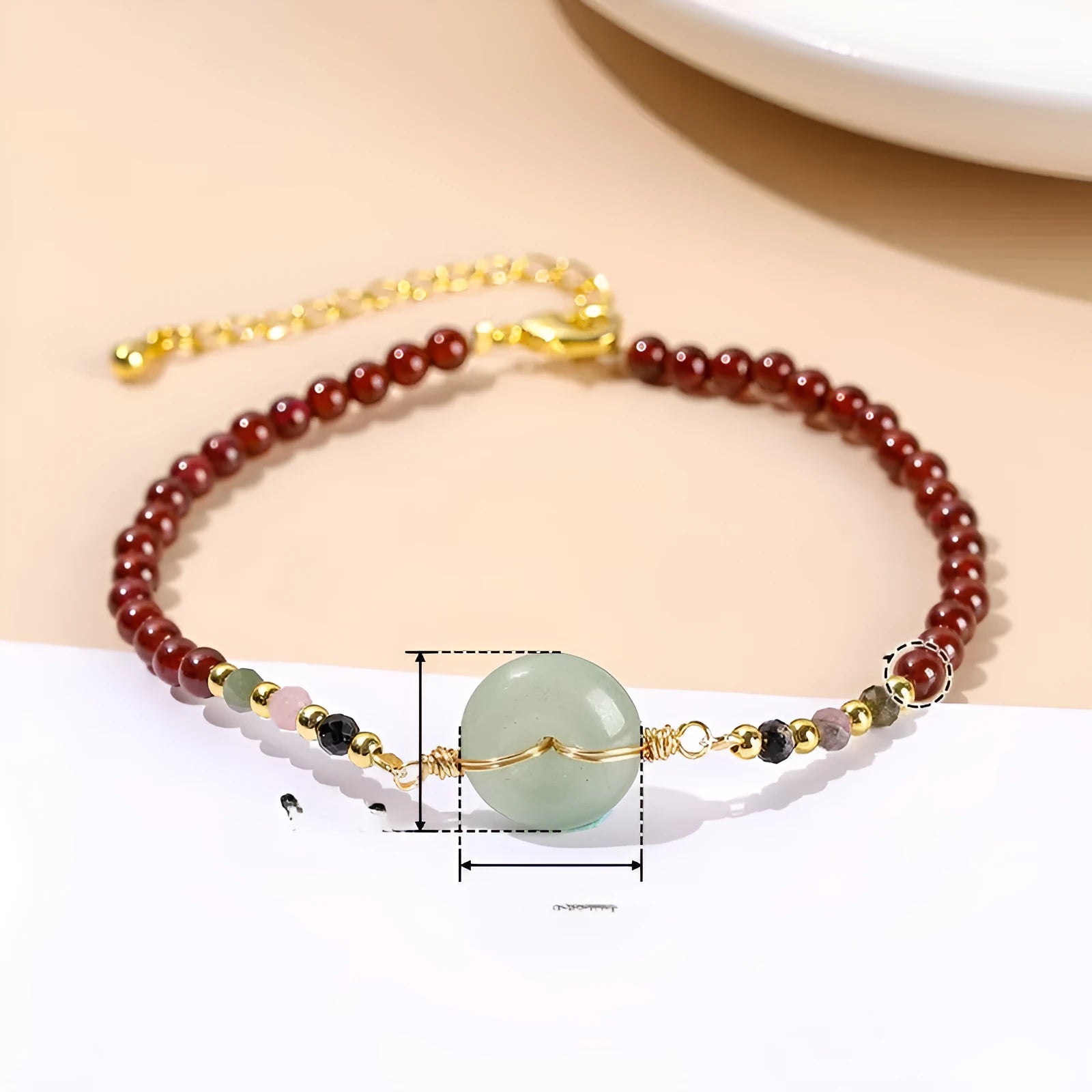 Women's crystal agate bracelet with garnet peace buckle safety clasp and round bead design