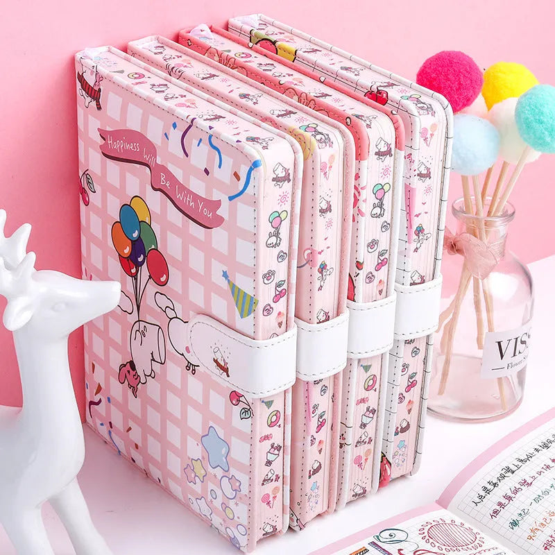 White portable notebook with magnetic buckle showing Kaba bear hippo and heart design