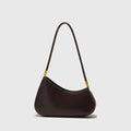 Women's retro oval underarm bag in PU leather available in seven colours with internal zipper organiser