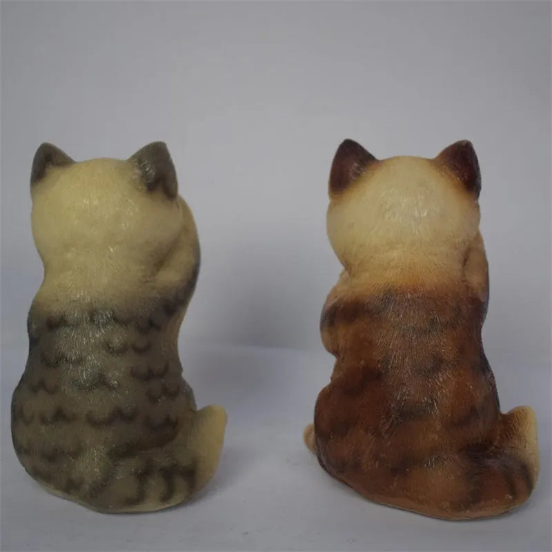 Brown cat-shaped solar-powered lawn light for garden decoration.