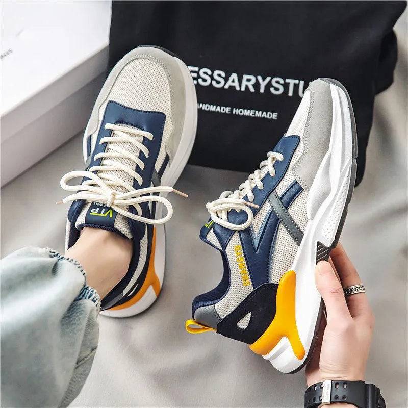 Men's low-top breathable running sneaker with mesh upper, orange and yellow options, injection moulded sole
