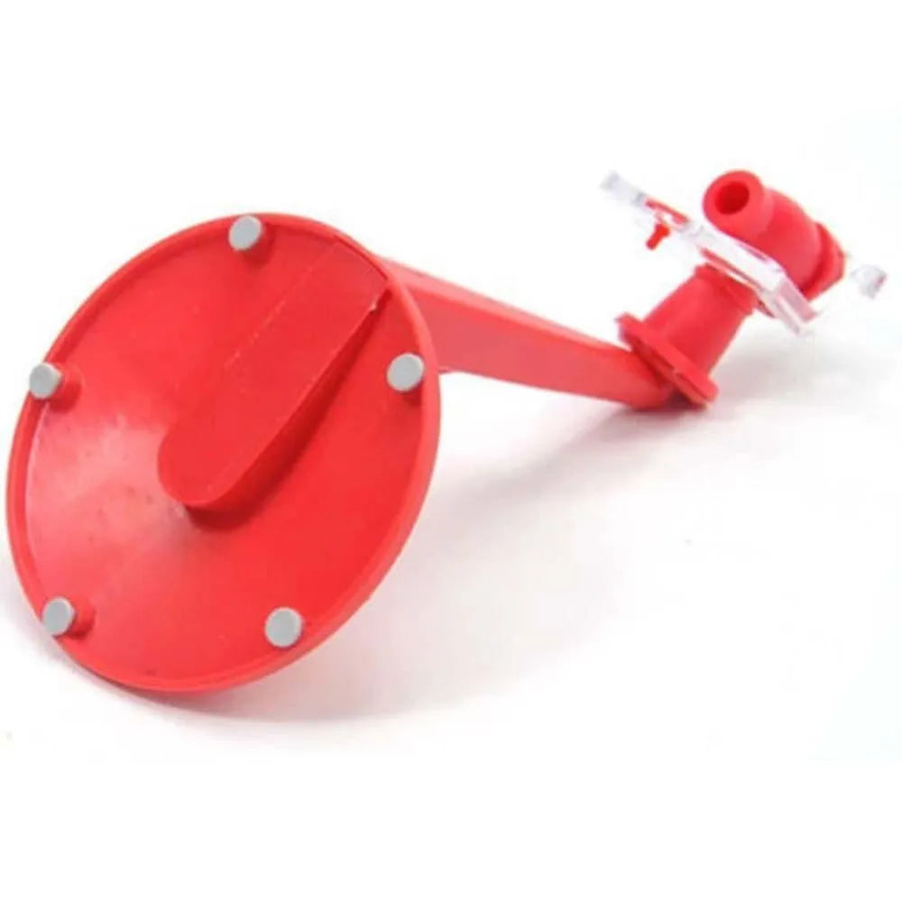 Red plastic Magic Tap soda dispenser attached to 2-litre bottle