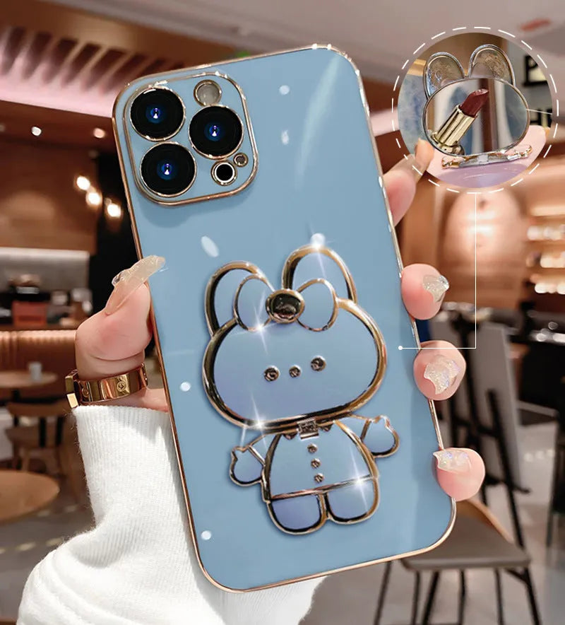 Cartoon rabbit stand mirror iPhone case in TPU with electroplated 3D design and anti-fall protection.