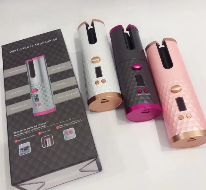 A white portable curling iron with a USB charging port and a gold ceramic barrel on a stand.