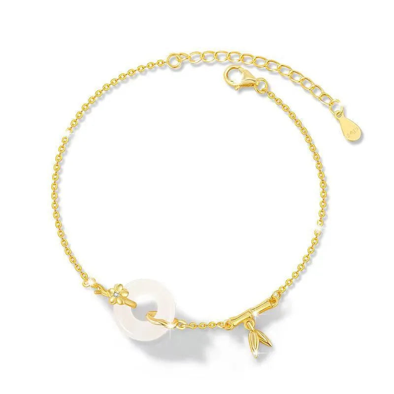 Women's silver bracelet with gold plating and white chalcedony starry sky design