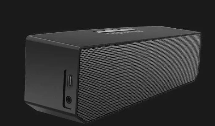 Black BS-6 Cloud Smart Speaker with micro-USB port and compact design.