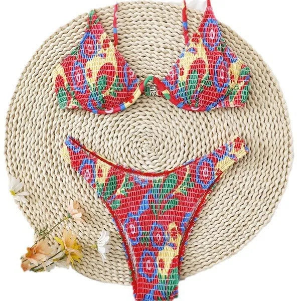 Red floral pattern women's underwire triangle bikini swimsuit with briefs, shown on a model.