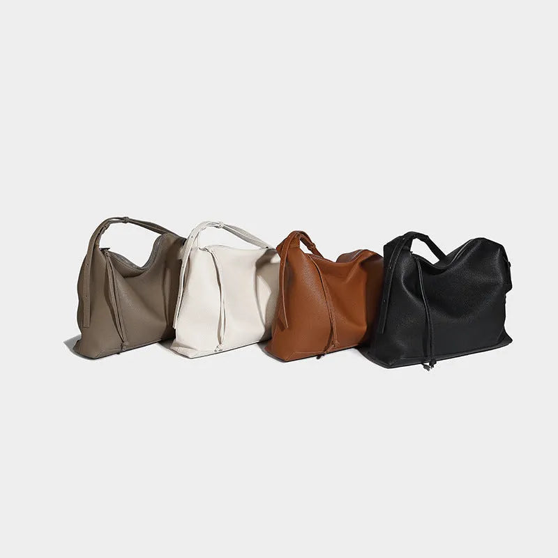 Caramel coloured soft PU messenger bag with underarm shoulder strap