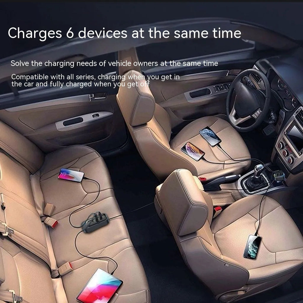 Black universal car charger with four USB ports plugged into a vehicle cigarette lighter socket.