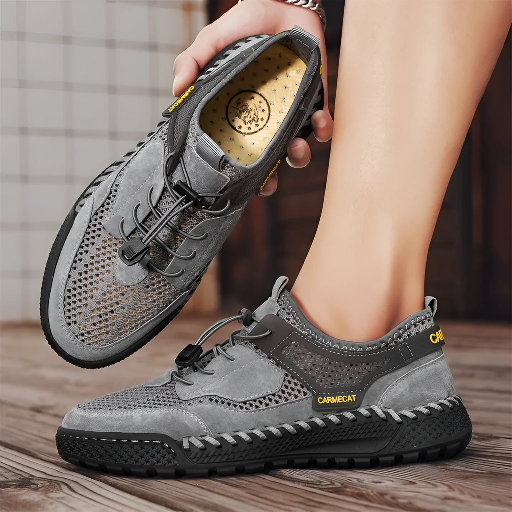 Men's brown suede low-top casual tennis shoes with elastic band and hand-stitched rubber sole.