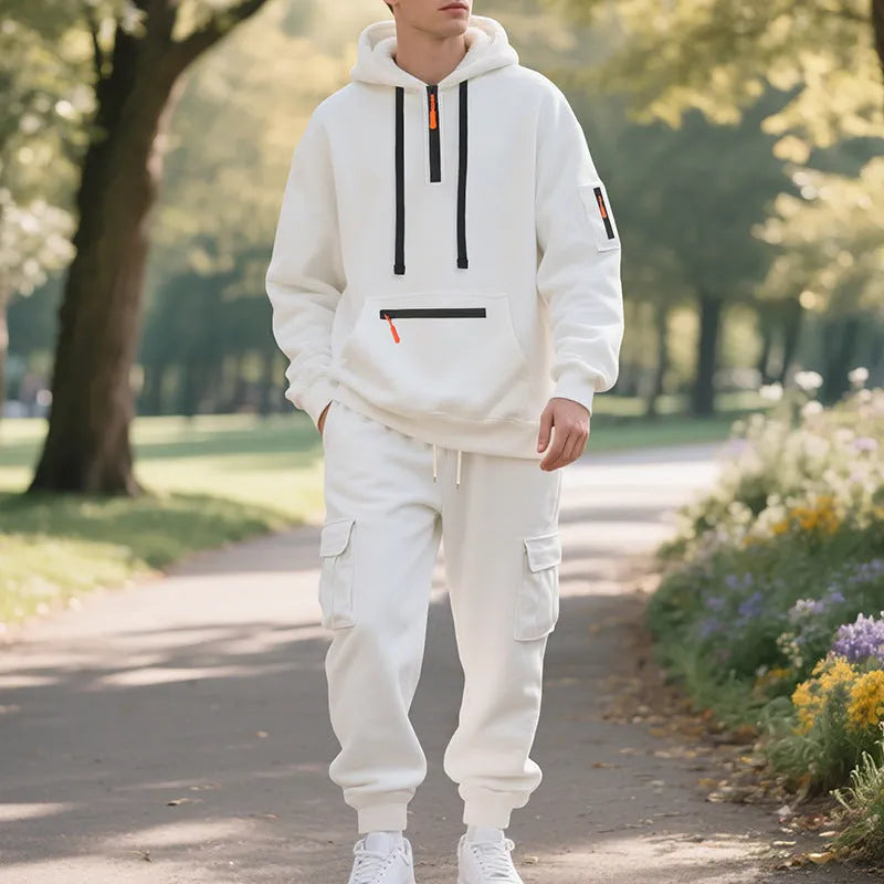 Men's loose two-piece hoodie set with fleece-lined hood, zip front, and multi-pocket top in dark gray.
