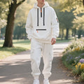 Men's loose two-piece hoodie set with fleece-lined hood, zip front, and multi-pocket top in dark gray.