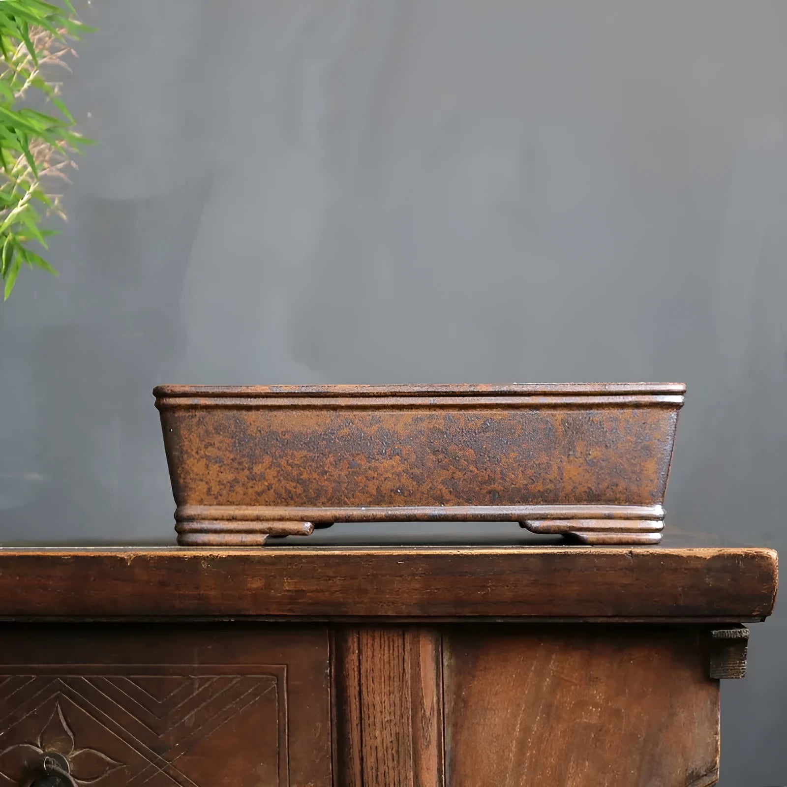 A rectangular purple sand bonsai pot with a linear firewood burning pattern, shown in two sizes.