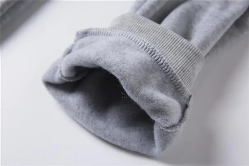 Letter printed men's casual sweater suit in black, showing top and trousers