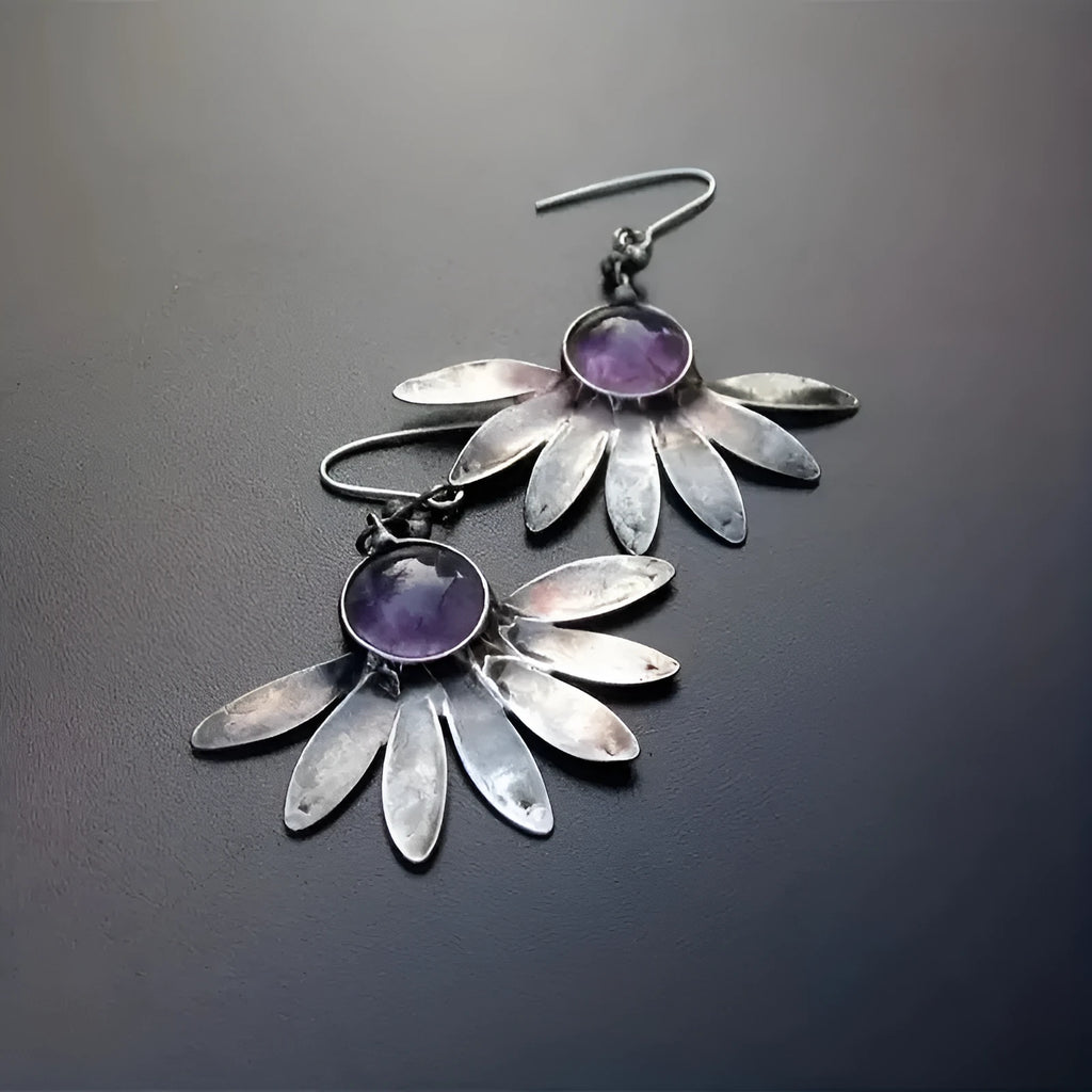 Purple Bohemian earrings with animal modelling and resin gemstone details on alloy framework