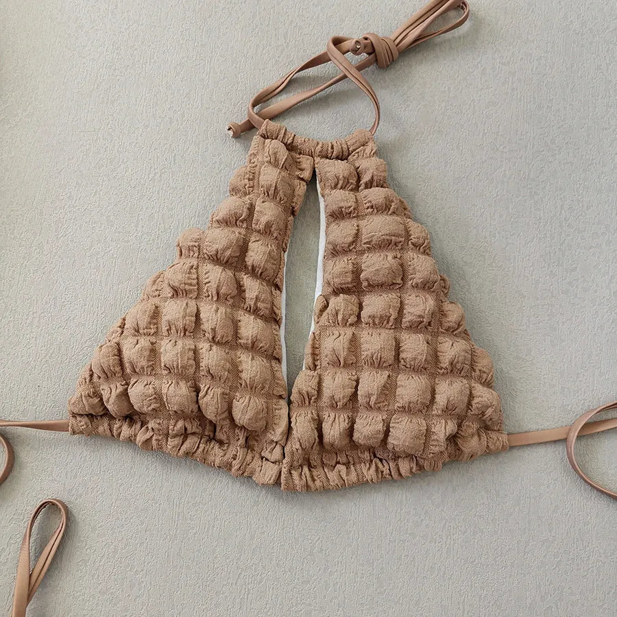 Brown seersucker three-piece bikini swimsuit with lace-up top, matching pants, and skirt for women