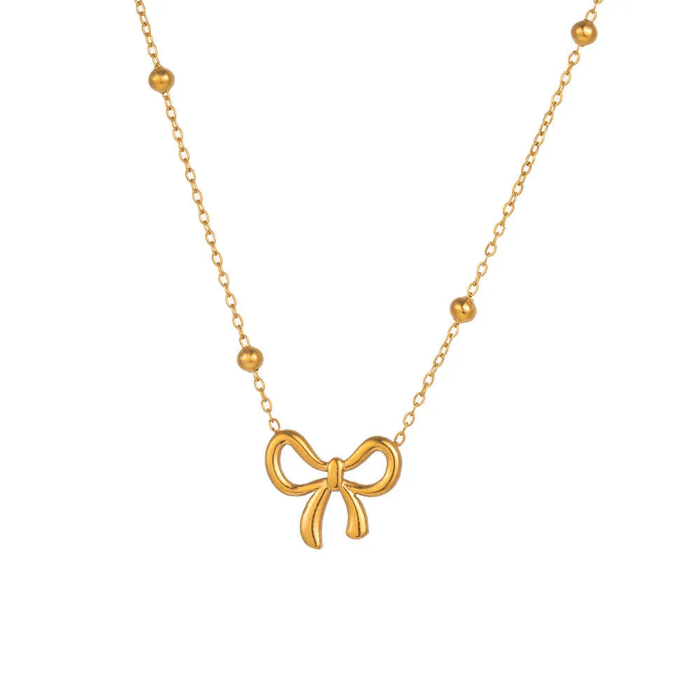 Gold titanium steel bow necklace for women with adjustable length and cross chain design