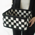 Checkerboard patterned grey felt storage basket with folded sides, shown with dimensions 37cm by 29cm by 19.5cm.