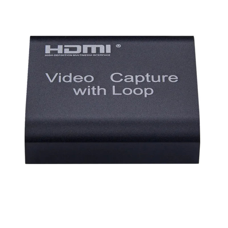 Black HDMI 4K video capture card with loop out and USB interface for computer or smartphone.