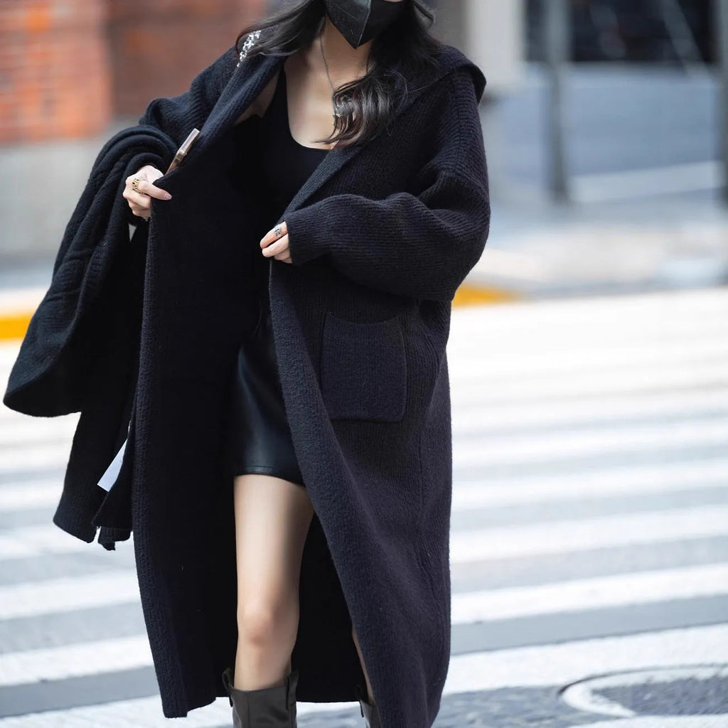 Long grey knitted cardigan hooded trench coat with cashmere wool blend fabric shown front view