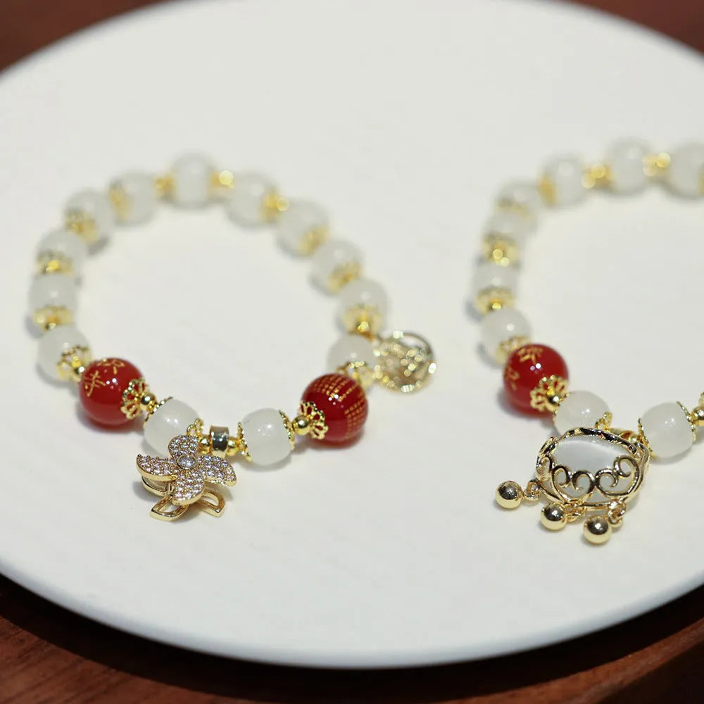 Chinese style women's coloured glaze bracelet with safety lock, windmill and bamboo charms