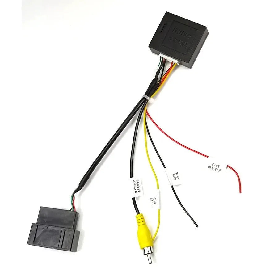 Black Volkswagen Skoda MIB host RGB camera signal conversion box for reverse camera installation.