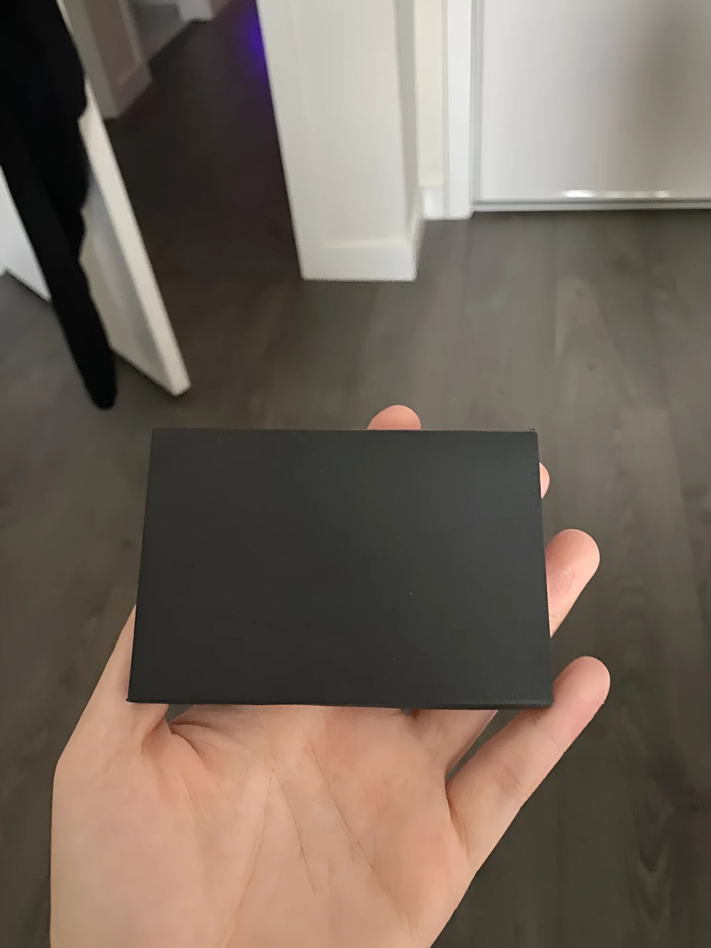 Black envelope 9x6cm on white background for invitations and cards