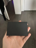 Black envelope 9x6cm on white background for invitations and cards
