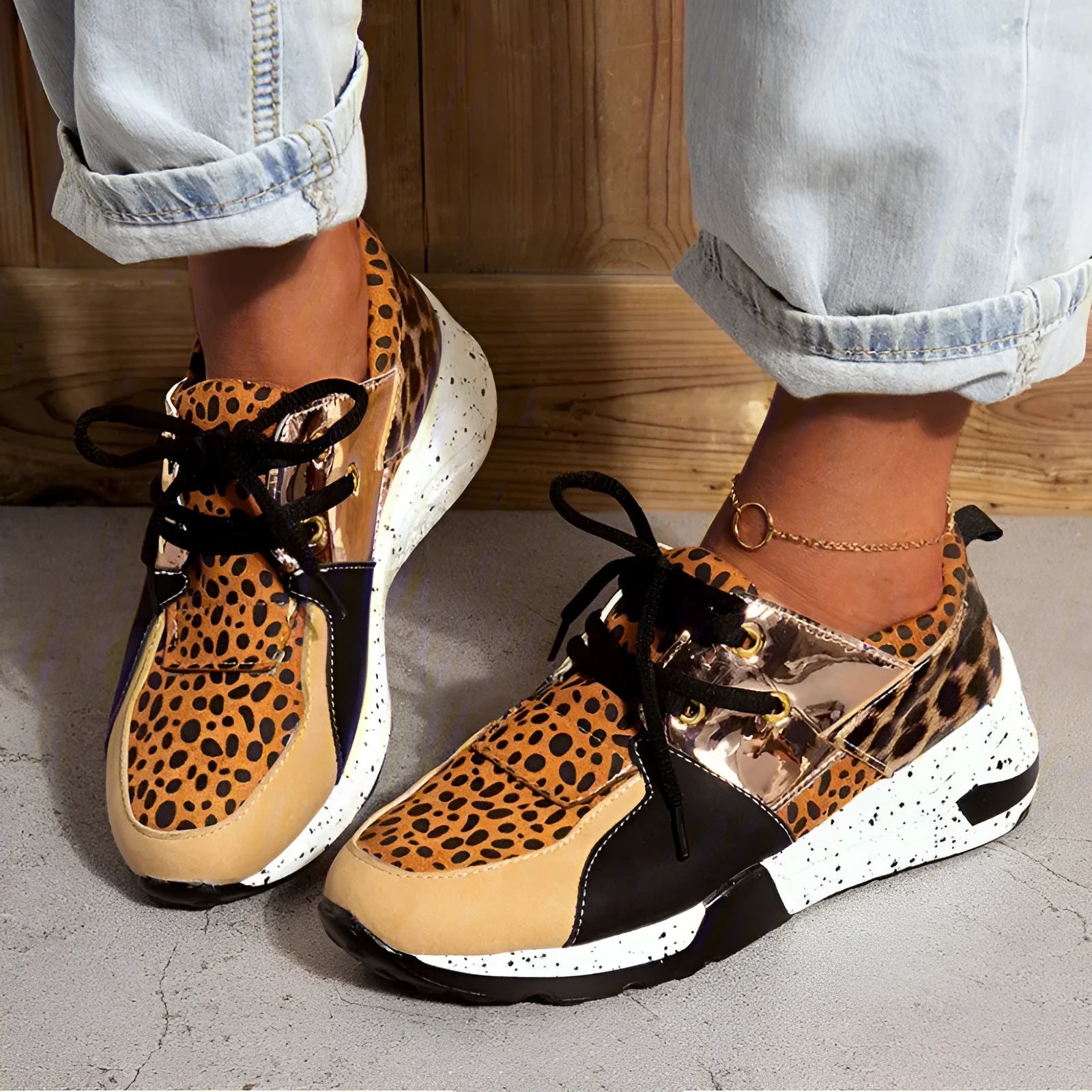 Women's casual suede sneakers with a wedge heel in black, leopard, pink, panther, and snake pattern colours.