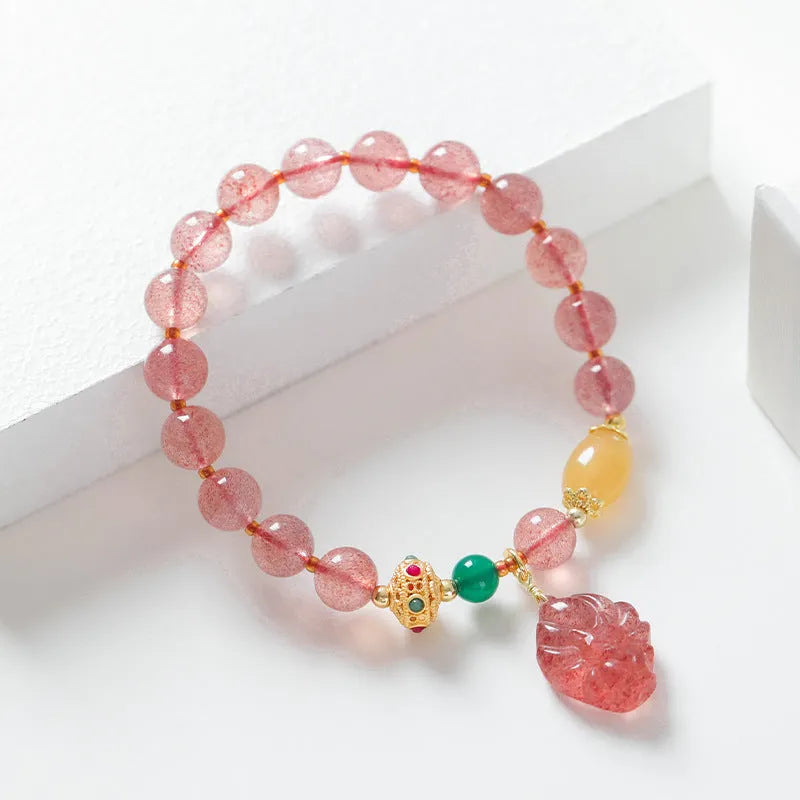 Women's strawberry quartz crystal bracelet with Nine Tail Fox beaded design