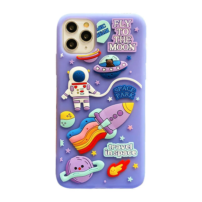Purple silicone iPhone case with a cartoon astronaut design, shown fitted on a phone.