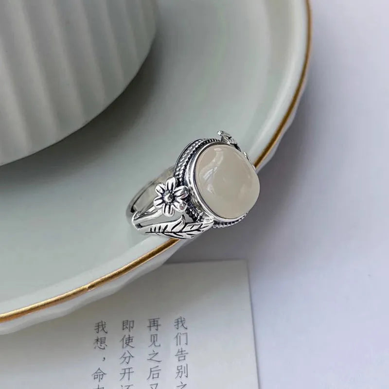 Adjustable copper vintage ring with white chalcedony gemstone and U-shaped band