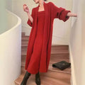 Women's grey knitted cardigan and dress two-piece suit set on a hanger.