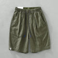 Men's linen shorts in straight drooping style with drawstring waist in black or green colour